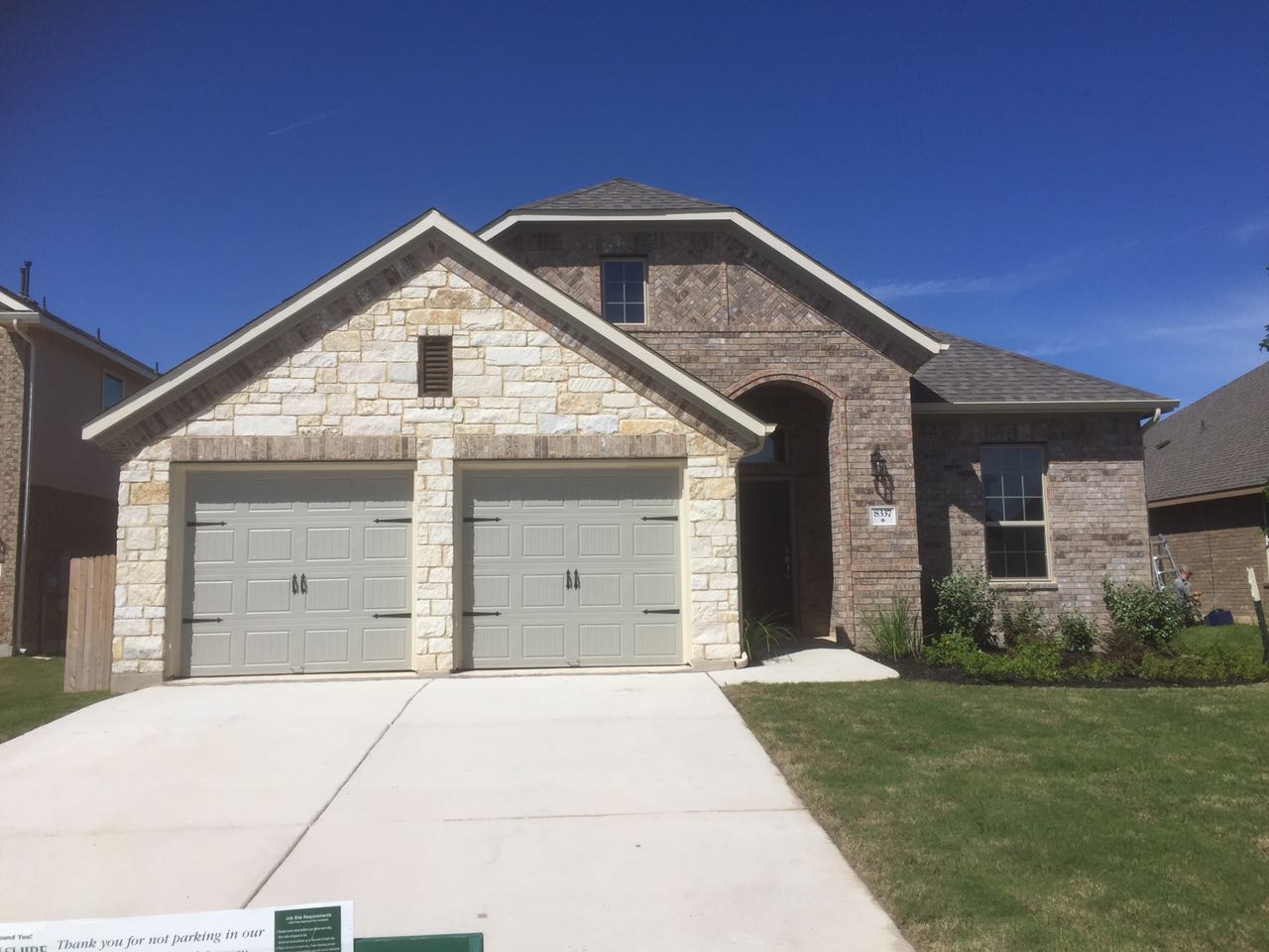 8337 Angelo Loop Round Rock, TX 78665 - Photo 1 of 22 a front view of a house with a yard