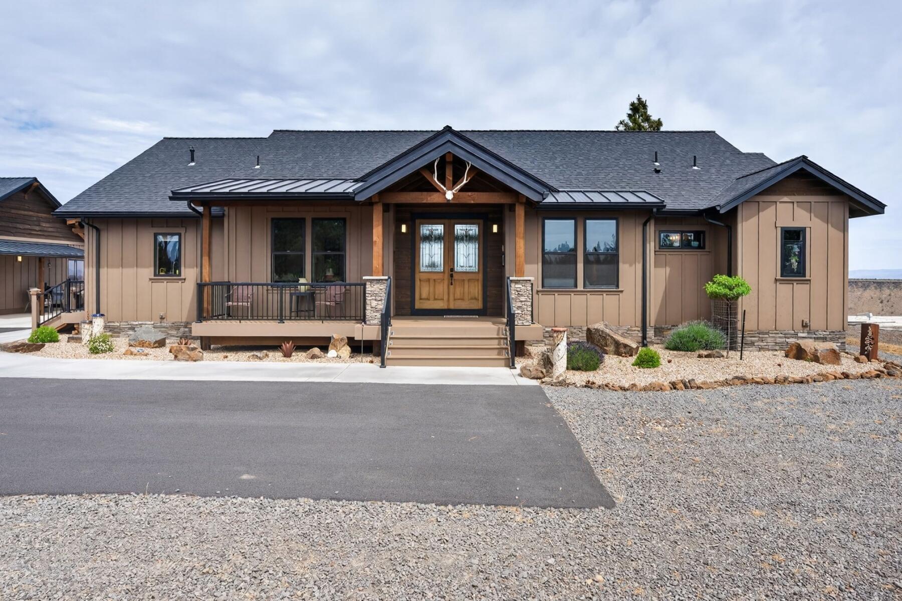 11620 Southwest Pixie Lane Culver, OR 97734 - Photo 4 of 53 a front view of a house with yard and parking