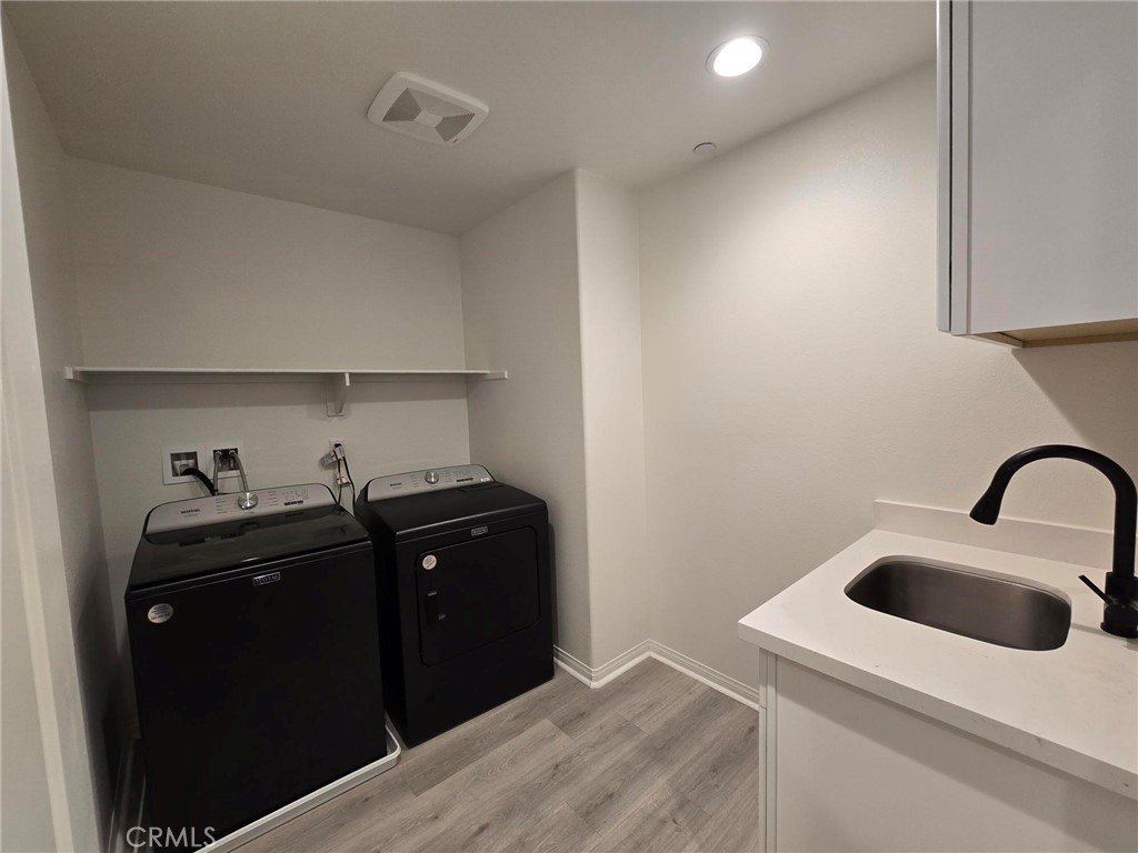 14196 Hercules Street Hesperia, CA 92345 - Photo 15 of 21 a kitchen with a sink and cabinets