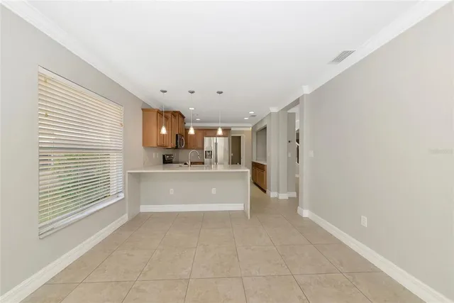 a view of kitchen with windows