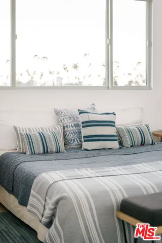 a view of a couch in a bed