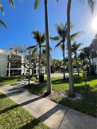 a view of a park with tree s