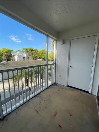 a view of a balcony with city view