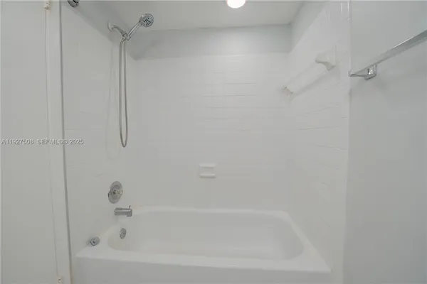 a close view of a bathtub in bathroom
