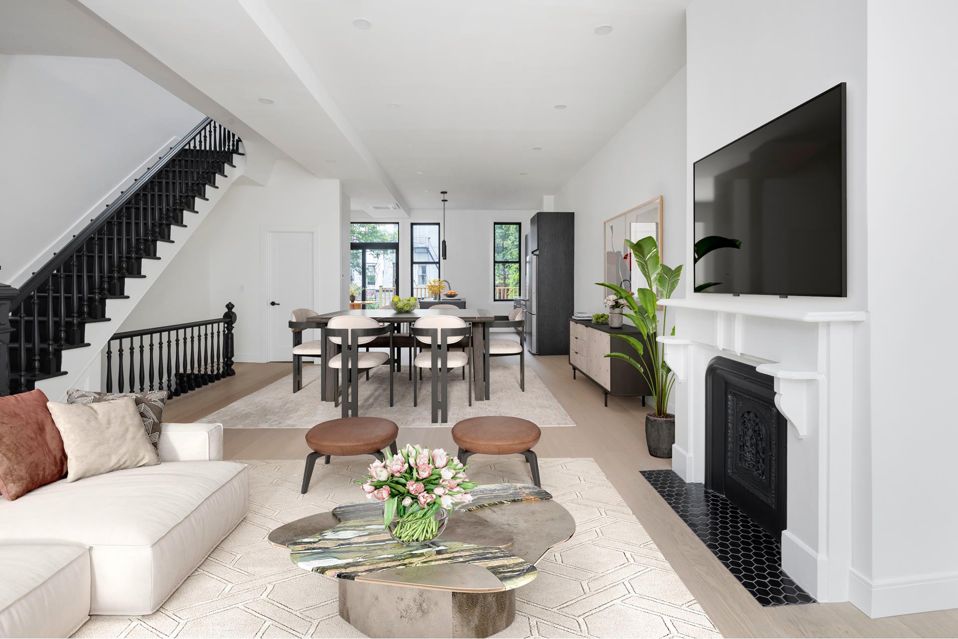 45 Cornelia Street Brooklyn, NY 11221 - Photo 1 of 1 a view of a livingroom with furniture a fireplace and a flat screen tv
