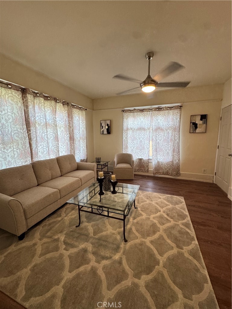 3857 Pine Street Riverside, CA 92501 - Photo 12 of 28 a living room with furniture and a large window