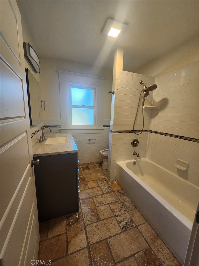 3857 Pine Street Riverside, CA 92501 - Photo 18 of 28 a utility room with a washer and dryer