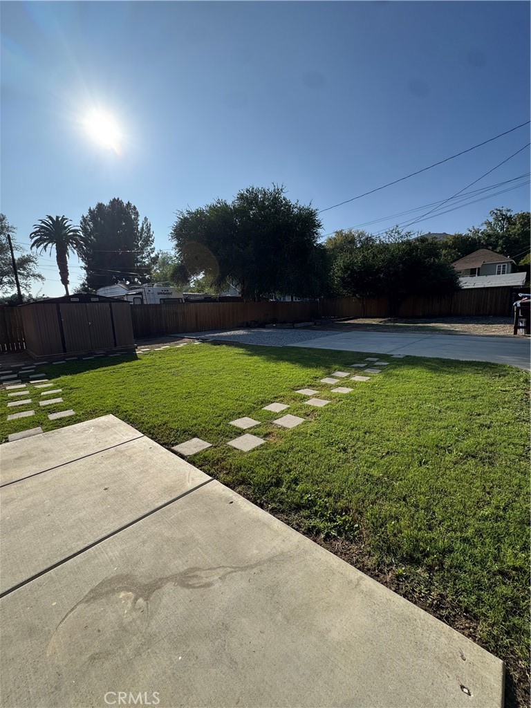 3857 Pine Street Riverside, CA 92501 - Photo 28 of 28 a view of a swimming pool and lounge chairs