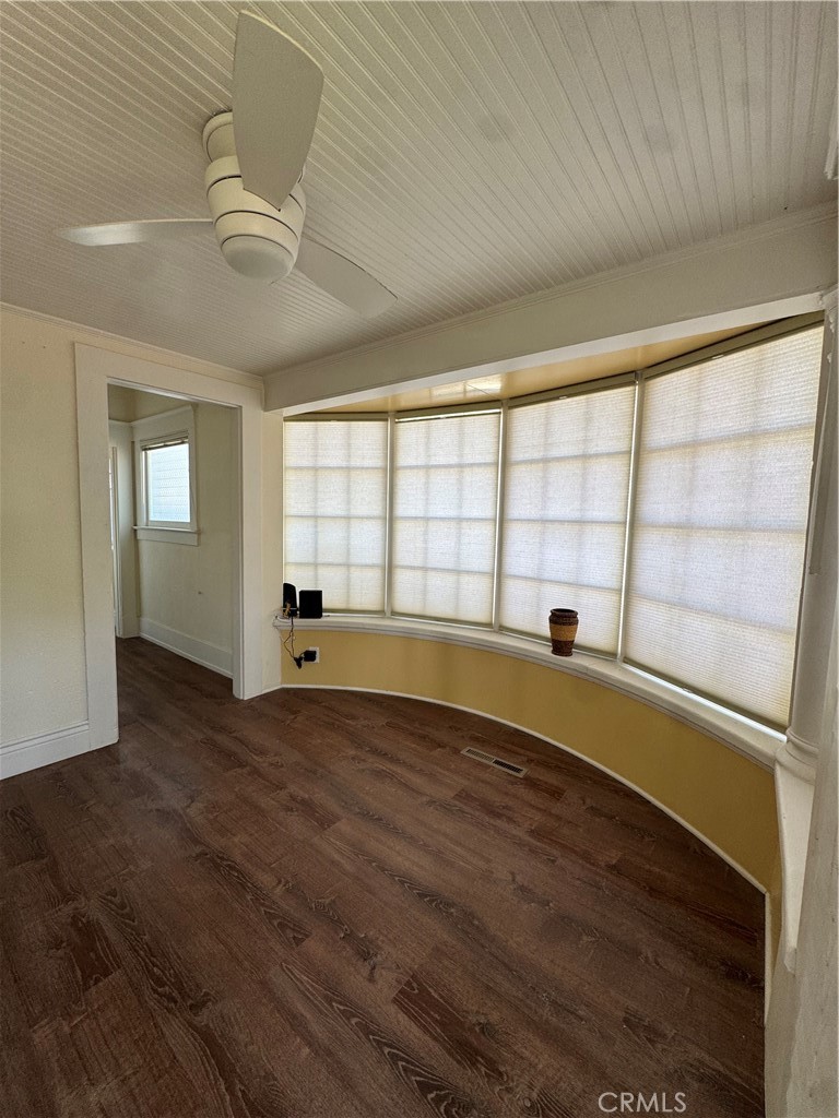 3857 Pine Street Riverside, CA 92501 - Photo 5 of 28 a view of empty room with wooden floor and fan