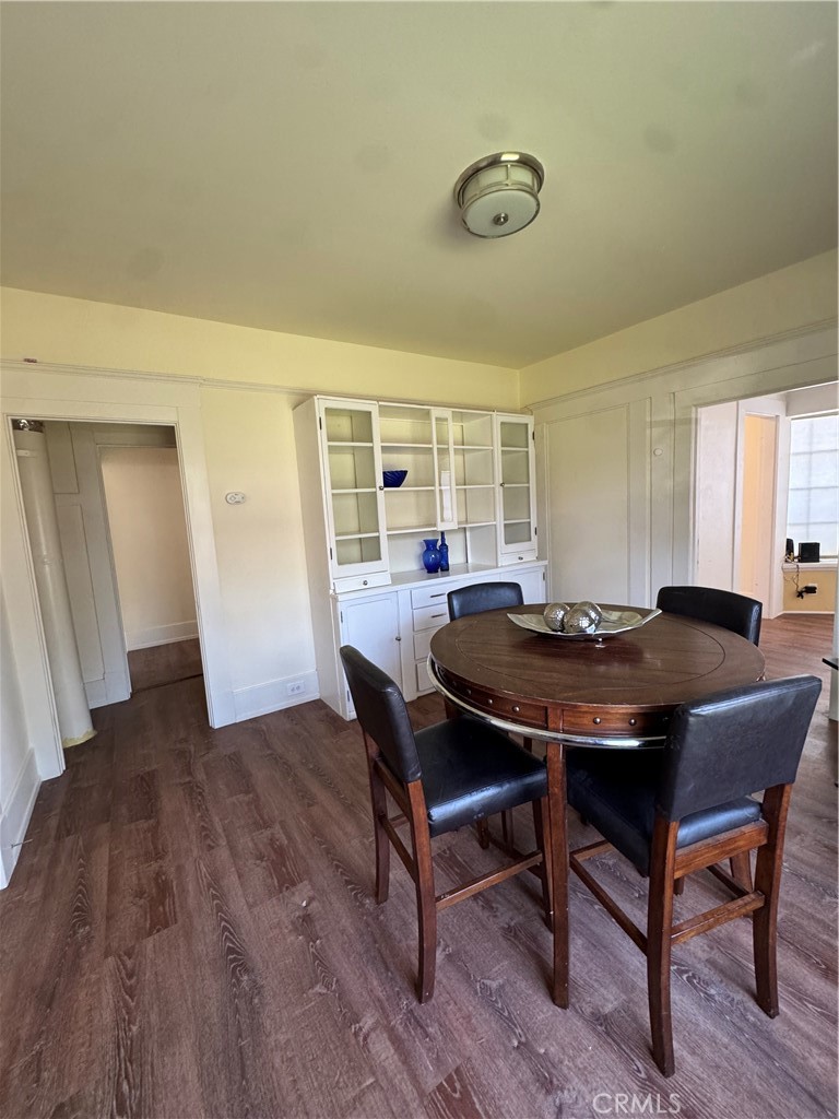 3857 Pine Street Riverside, CA 92501 - Photo 10 of 28 a view of a dining room with furniture and wooden floor