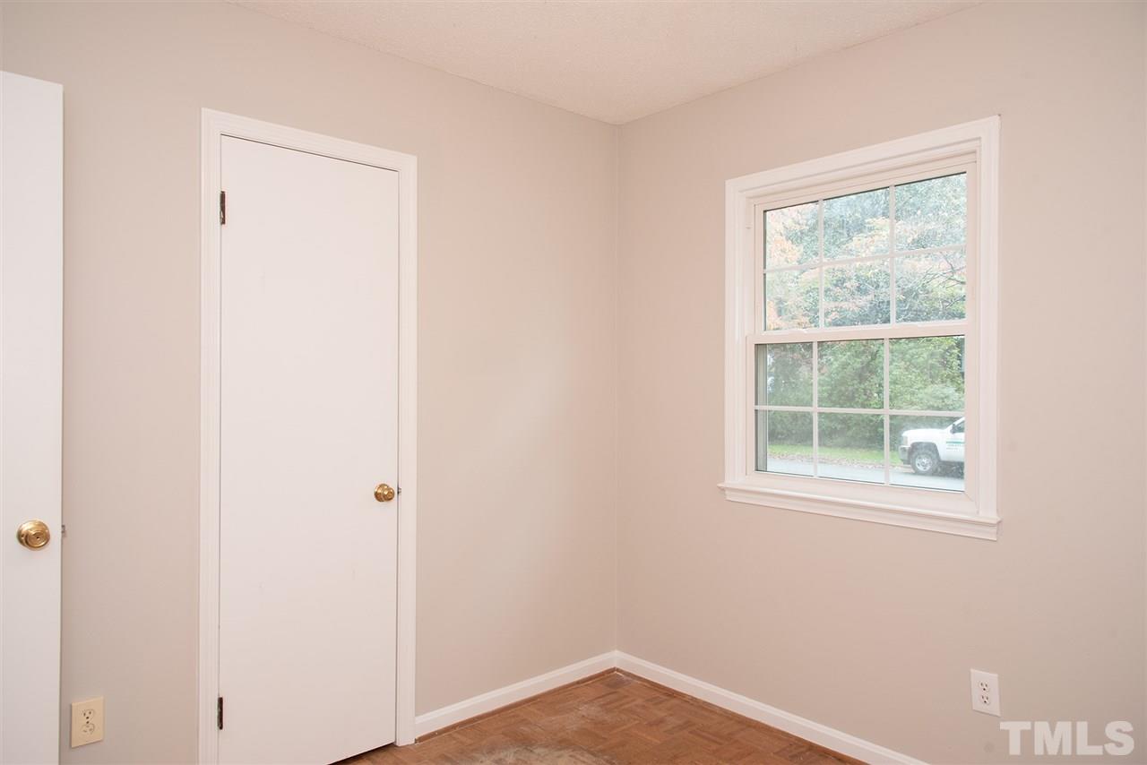 612 Old Farm Road Raleigh, NC 27606 - Photo 22 of 25 a view of an empty room with a window