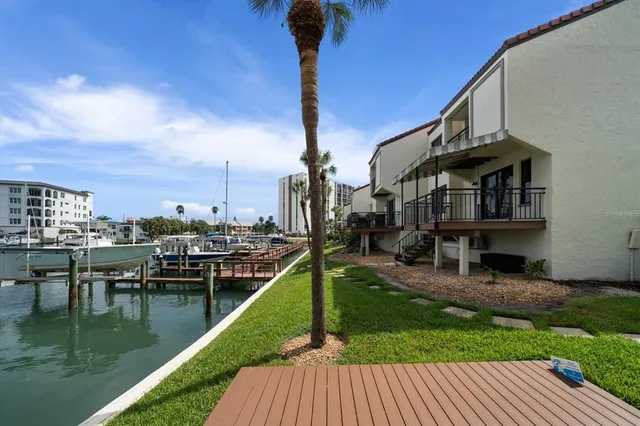 a front view of residential houses with yard