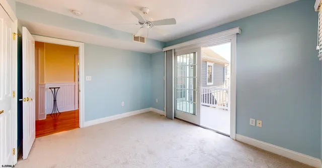 a bathroom with a sink vanity and a mirror