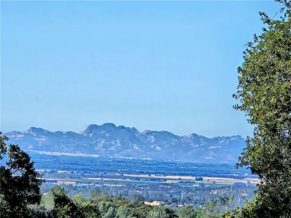 a view of a house with a mountain
