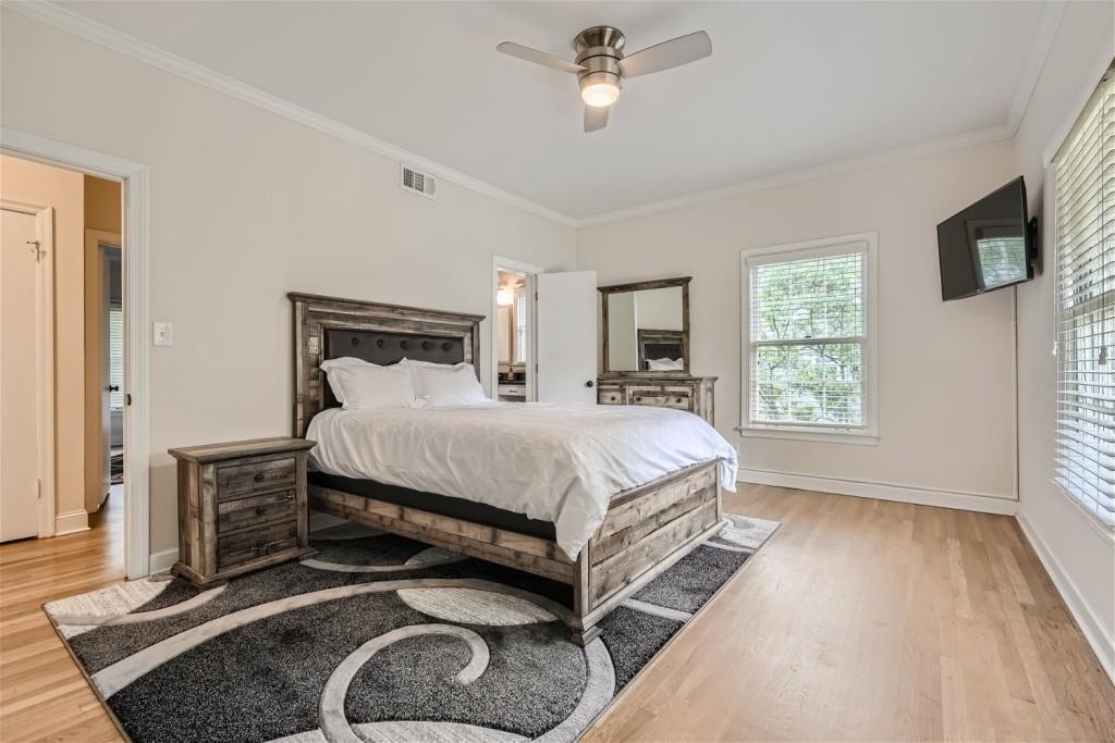 3685 Cantrell Road Northeast Atlanta, GA 30319 - Photo 13 of 25 a bed room with a bed furniture and a window