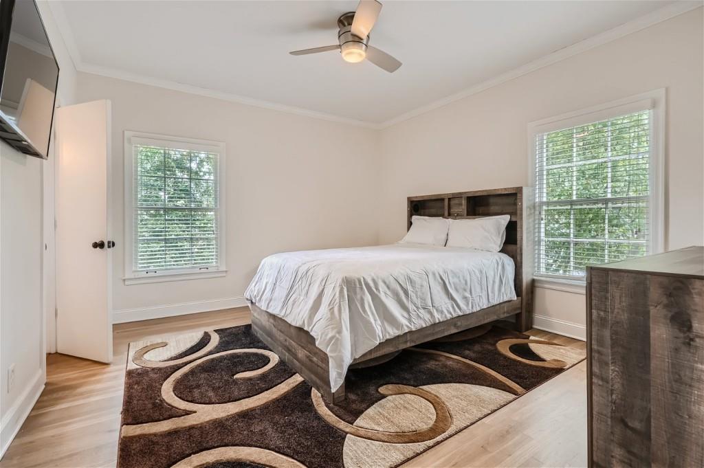3685 Cantrell Road Northeast Atlanta, GA 30319 - Photo 15 of 25 a bedroom with a bed and a window