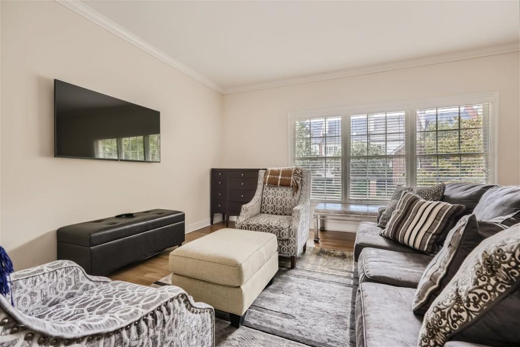 3685 Cantrell Road Northeast Atlanta, GA 30319 - Photo 18 of 25 a living room with furniture and a flat screen tv