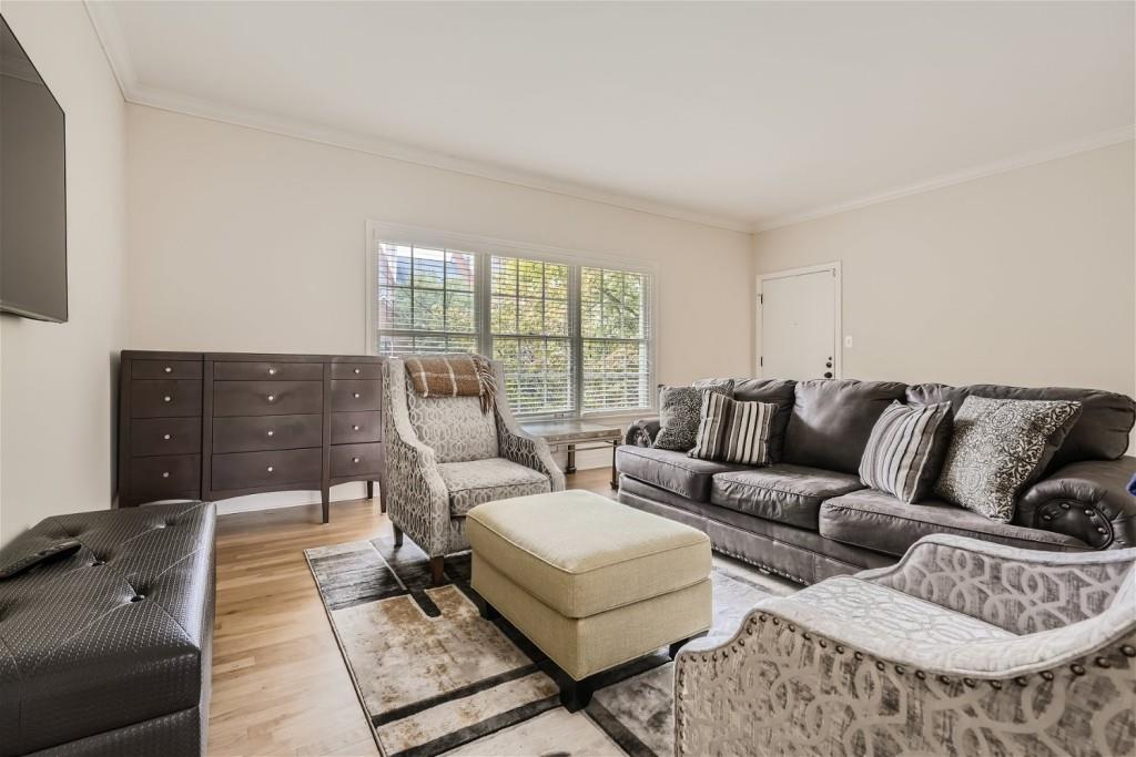 3685 Cantrell Road Northeast Atlanta, GA 30319 - Photo 19 of 25 a living room with furniture and a window