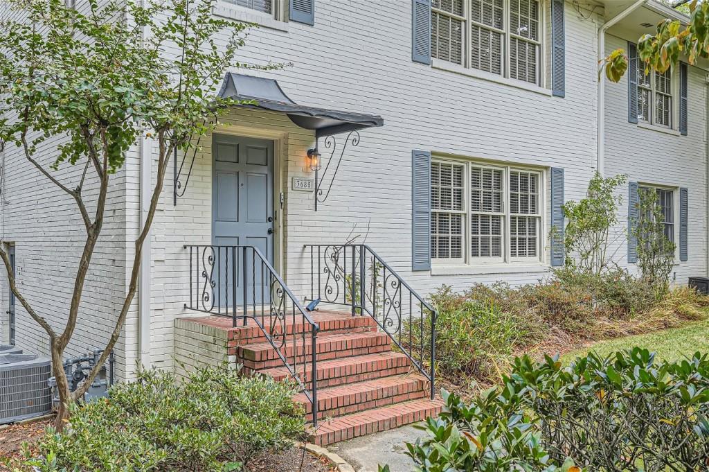 3685 Cantrell Road Northeast Atlanta, GA 30319 - Photo 2 of 25 a front view of a house with a yard