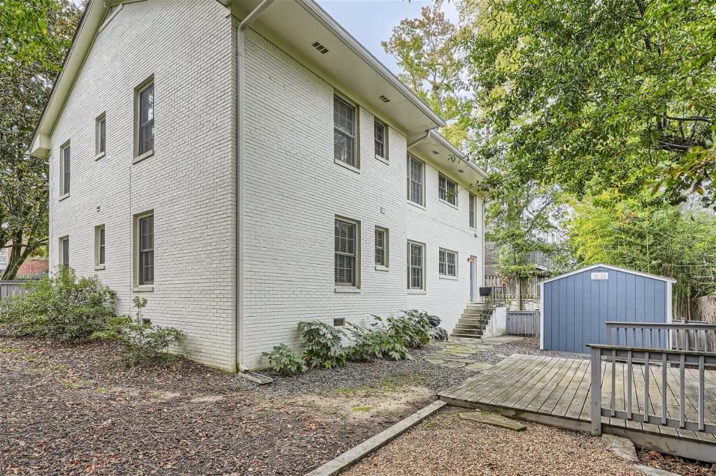 3685 Cantrell Road Northeast Atlanta, GA 30319 - Photo 25 of 25 a backyard of a house with table and chairs