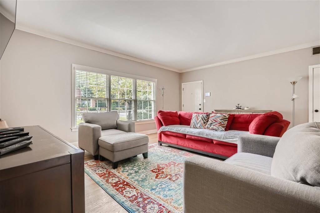 3685 Cantrell Road Northeast Atlanta, GA 30319 - Photo 5 of 25 a living room with furniture and a window