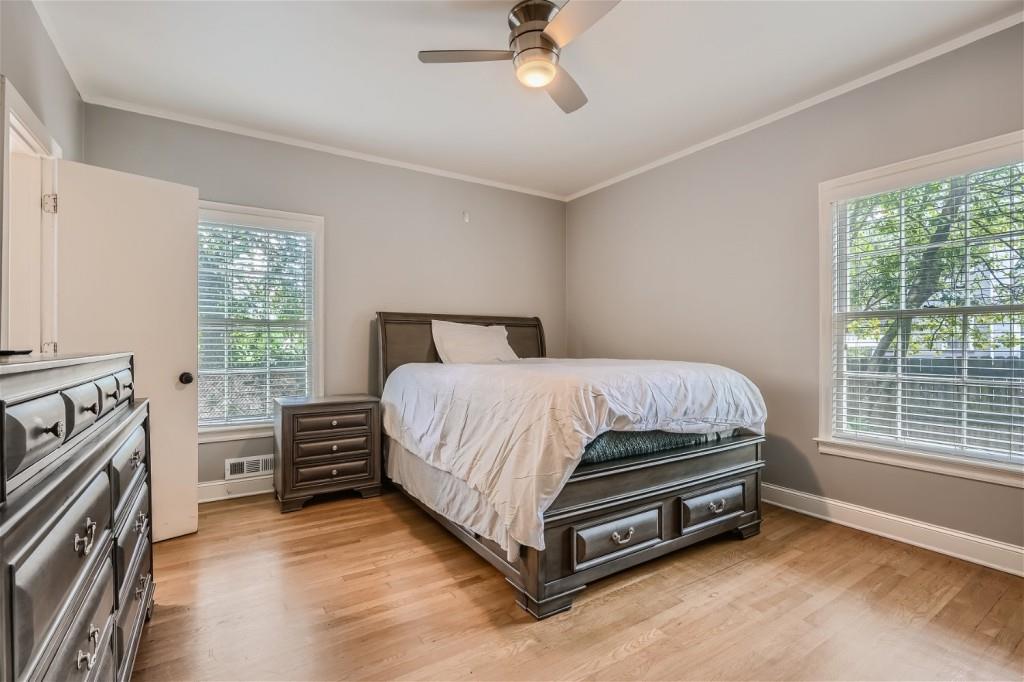 3685 Cantrell Road Northeast Atlanta, GA 30319 - Photo 9 of 25 a bedroom with a bed and a window