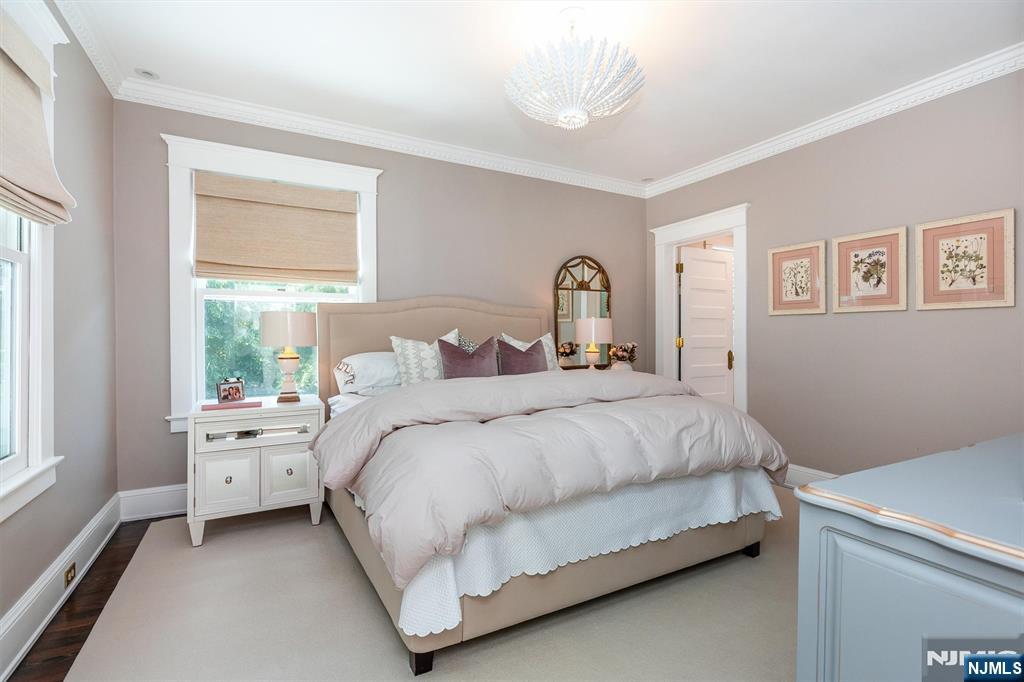 380 Ridgewood Avenue Glen Ridge, NJ 07028 - Photo 31 of 50 a bedroom with a bed and a large window