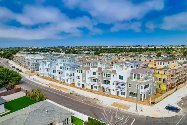 a view of a city with tall buildings