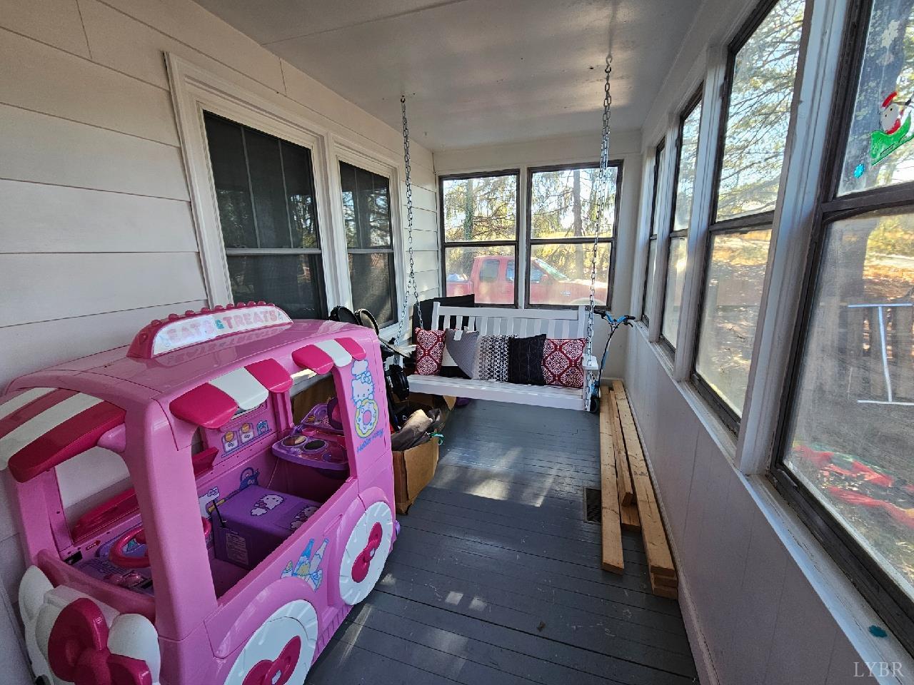 114 Riverview Road Hurt, VA 24563 - Photo 12 of 19 a bed sitting in a bedroom next to a window