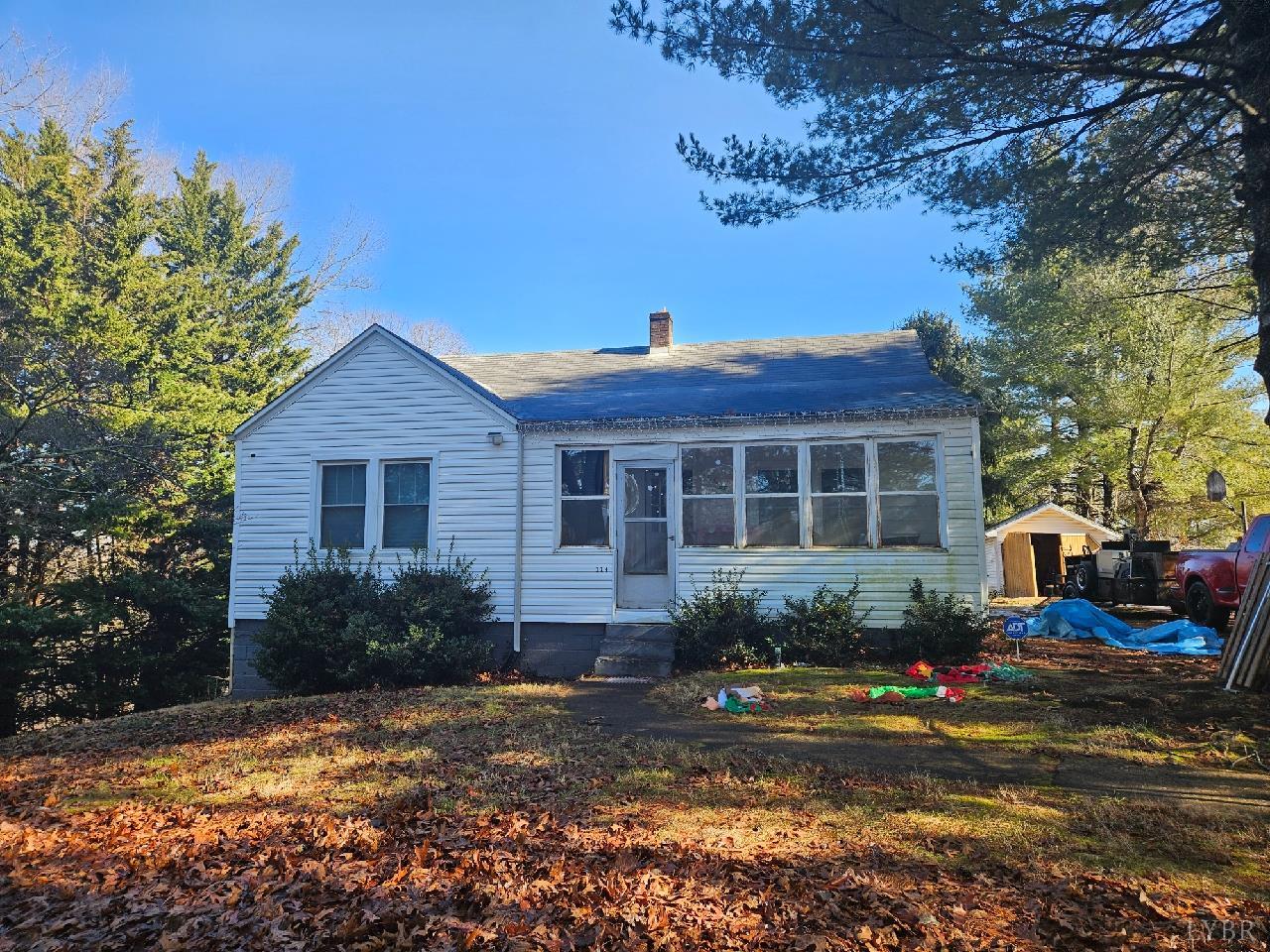 114 Riverview Road Hurt, VA 24563 - Photo 15 of 19 a front view of a house with a yard
