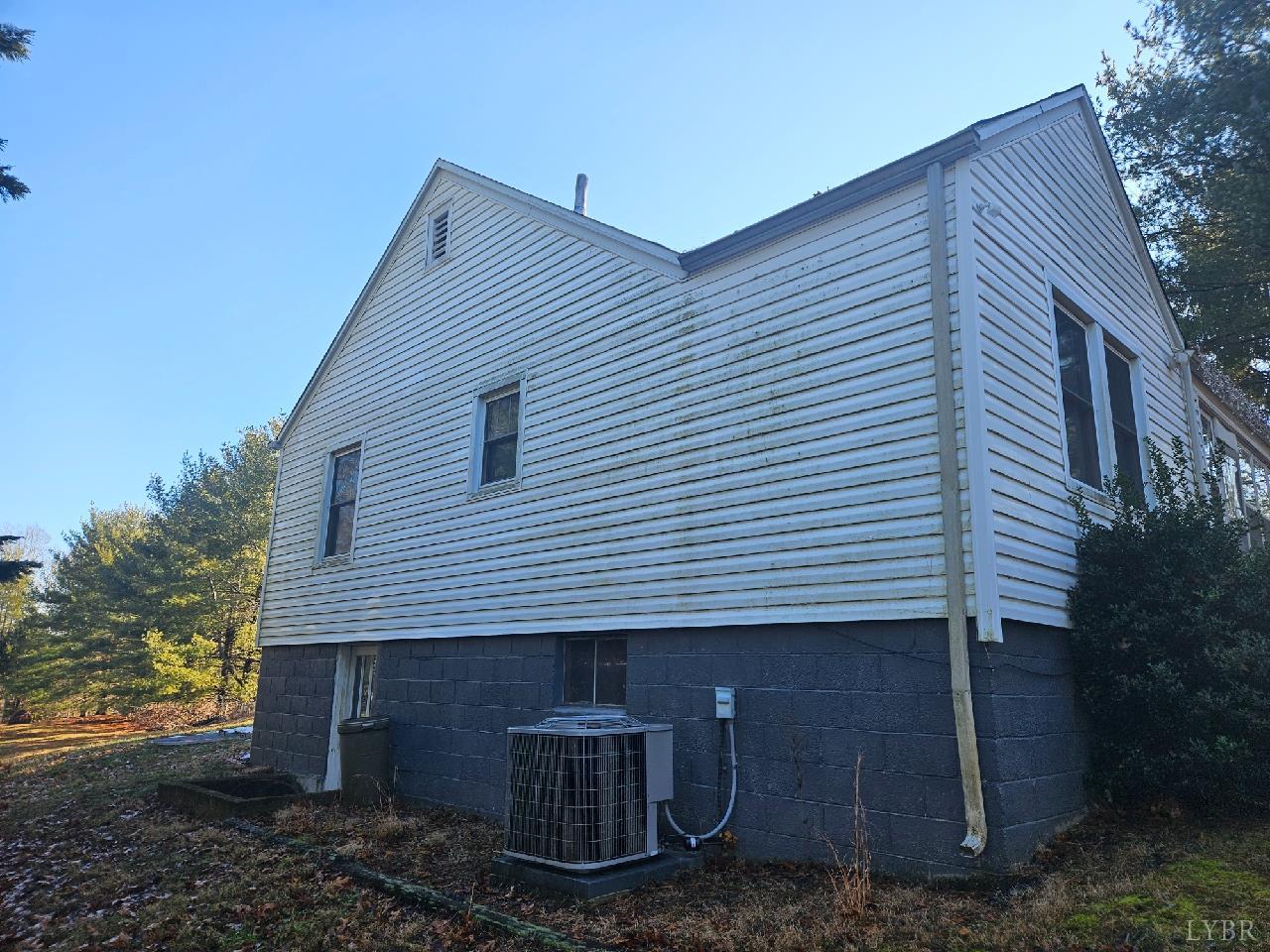 114 Riverview Road Hurt, VA 24563 - Photo 16 of 19 a view of a house with a yard and large tree