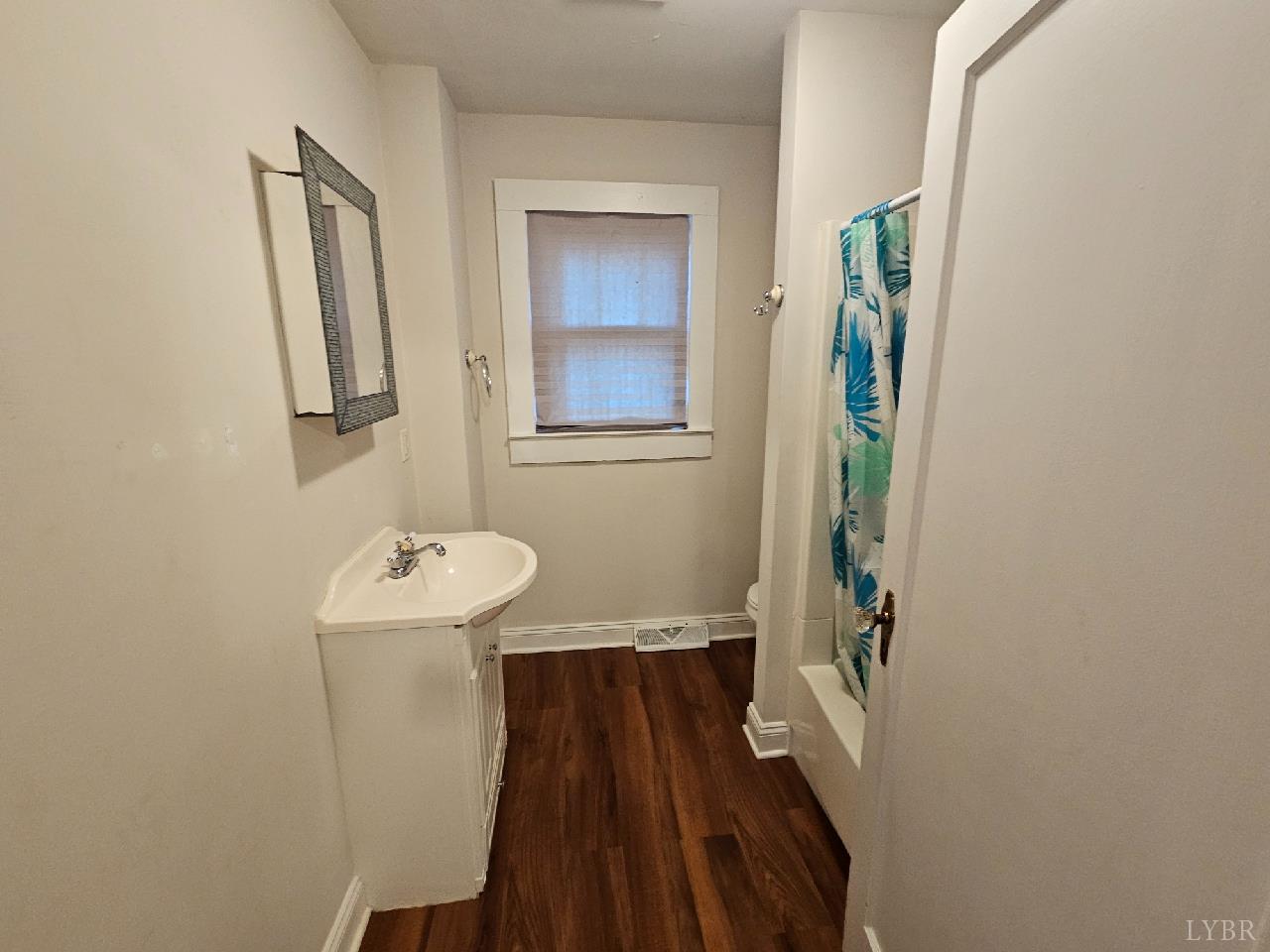 114 Riverview Road Hurt, VA 24563 - Photo 9 of 19 a bathroom with a sink and a mirror