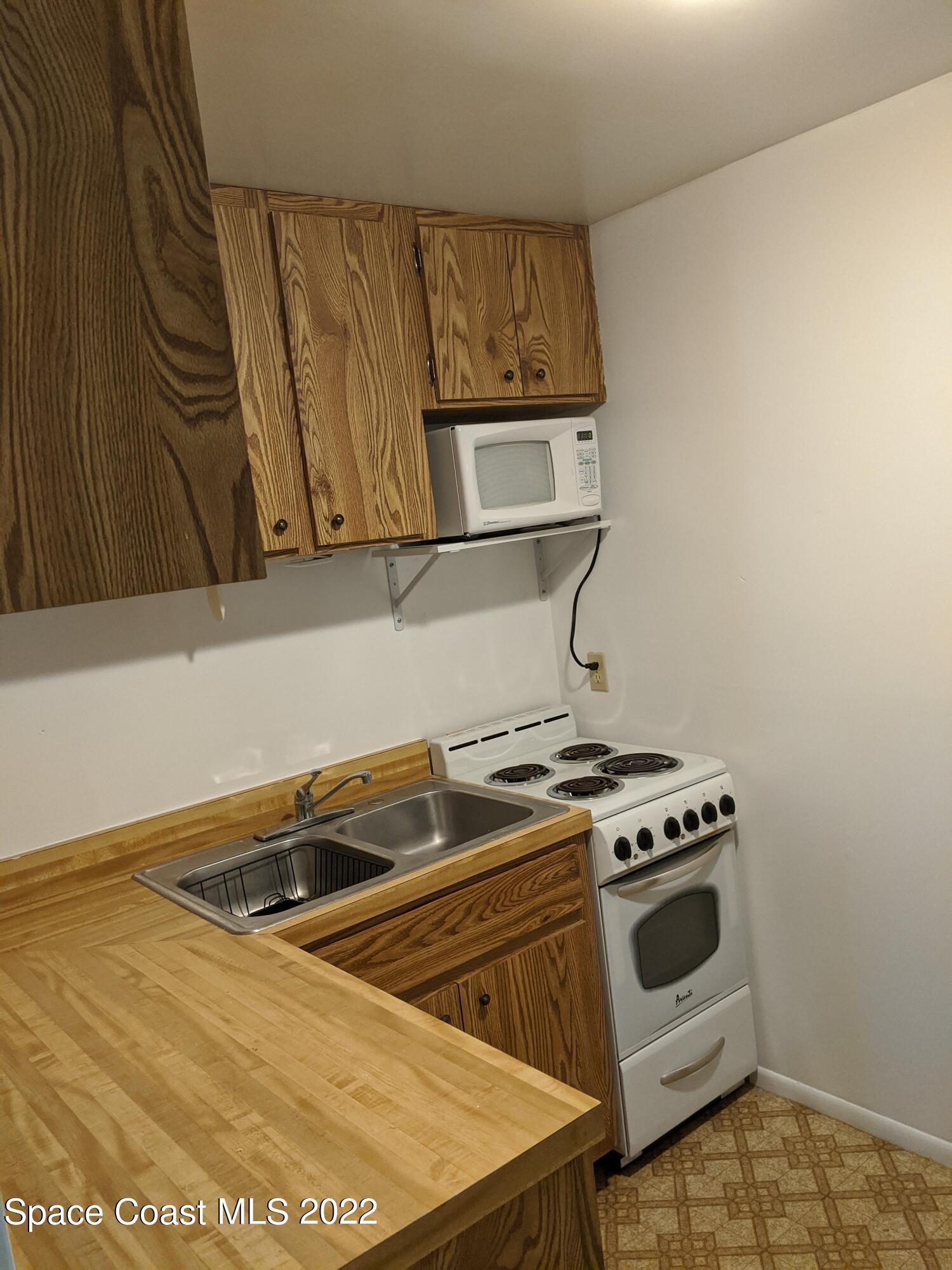 108 Barton Avenue, Unit B Rockledge, FL 32955 - Photo 5 of 12 IMG_20200313_154531