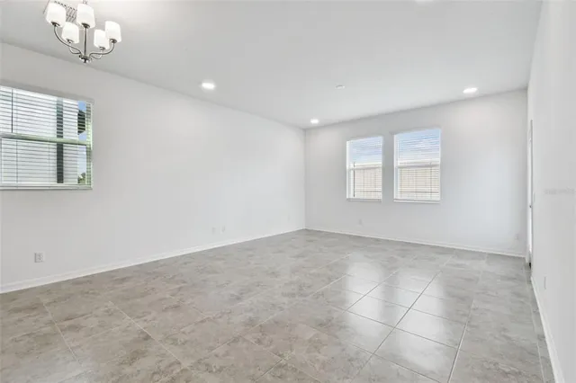 en empty room with windows