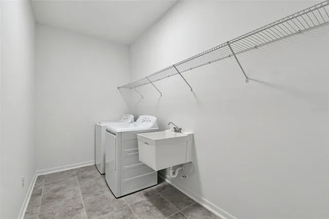 a bathroom with a sink a toilet and vanity