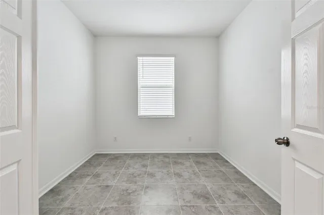 an empty room with a window