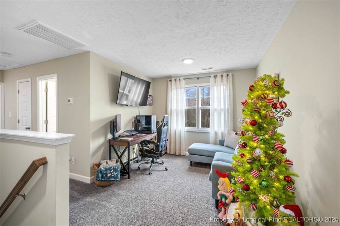 5512 Tolarsville Road St. Pauls, NC 28384 - Photo 15 of 30 a workspace with furniture and a window