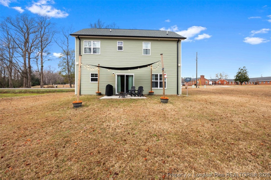 5512 Tolarsville Road St. Pauls, NC 28384 - Photo 24 of 30 a house with swimming pool in front of it