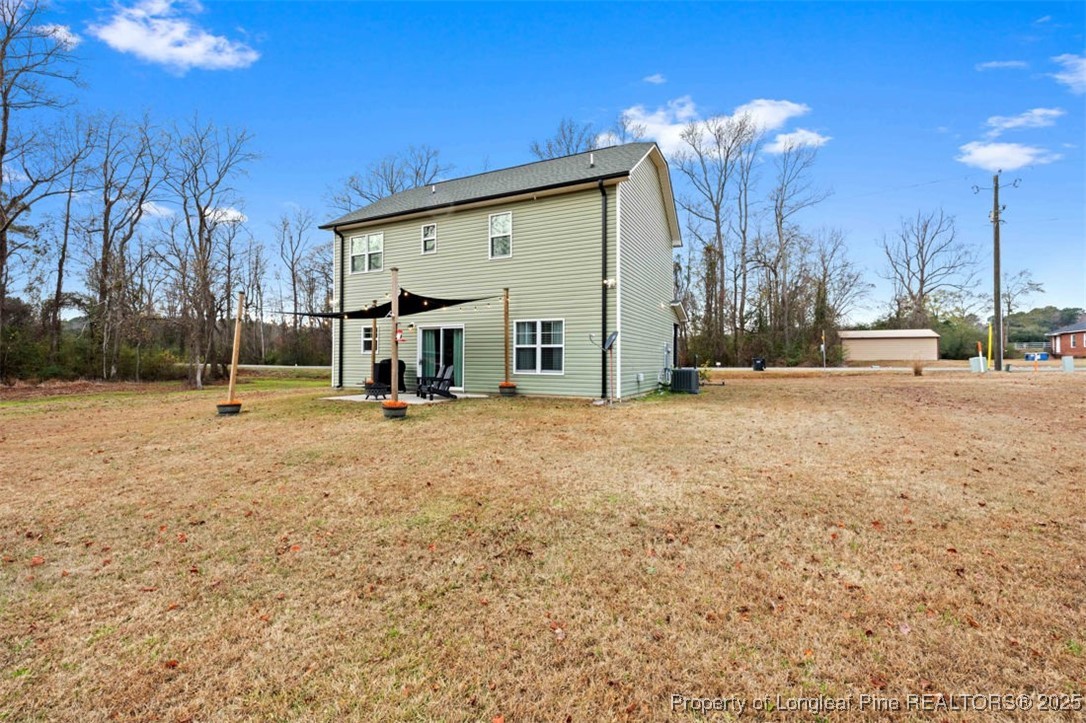 5512 Tolarsville Road St. Pauls, NC 28384 - Photo 25 of 30 a view of a house with a backyard