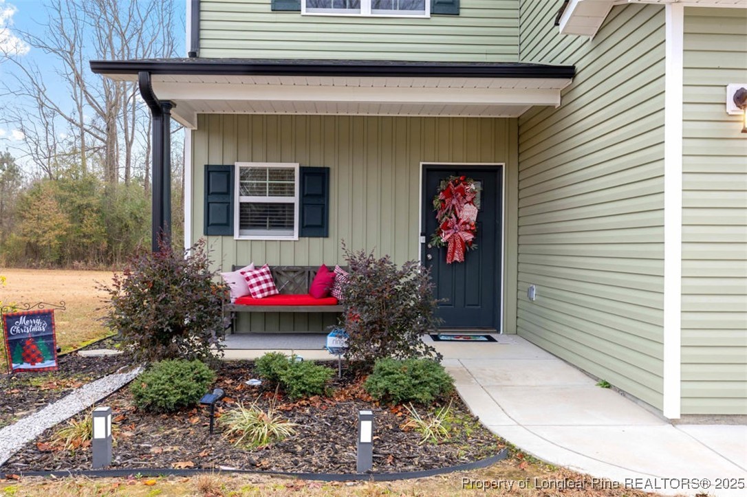5512 Tolarsville Road St. Pauls, NC 28384 - Photo 30 of 30 a front view of a house with a porch