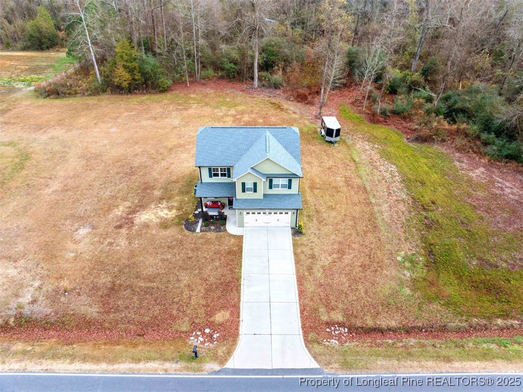 5512 Tolarsville Road St. Pauls, NC 28384 - Photo 3 of 30 a view of yard along with trees
