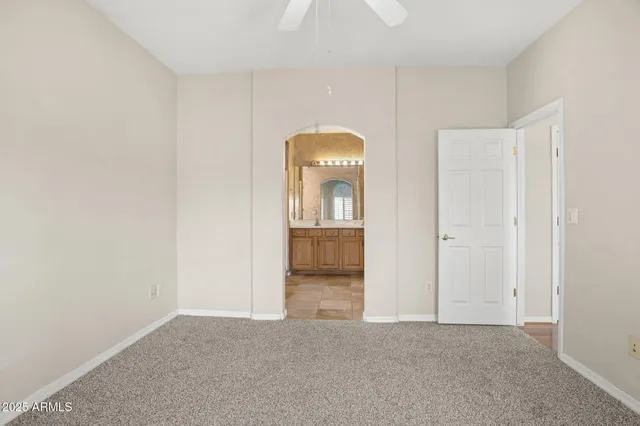 a kitchen with a refrigerator window and wooden floor