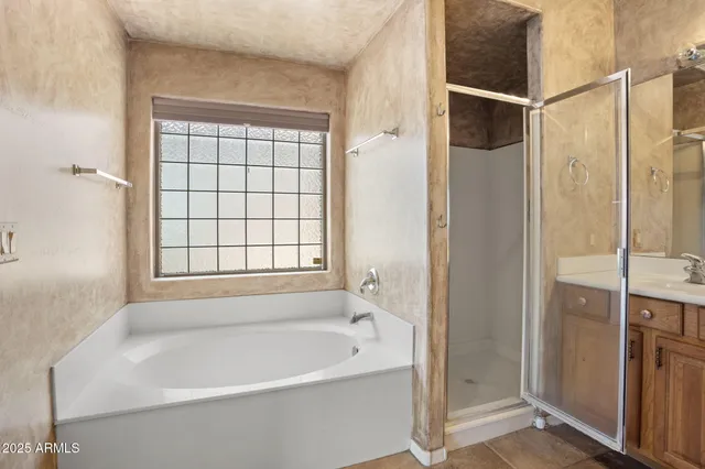 a view of an empty room and a window