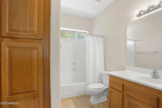 an empty room with a empty space and a window