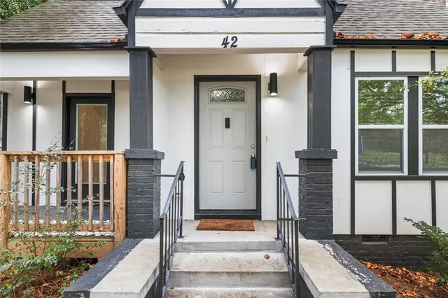 a front view of a house with a porch