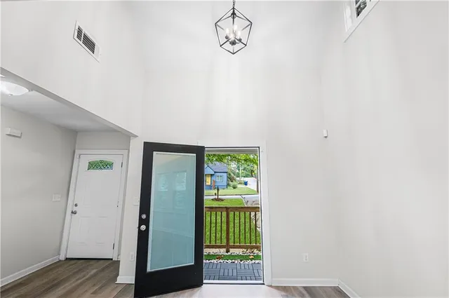 a view of a room that has a window in it