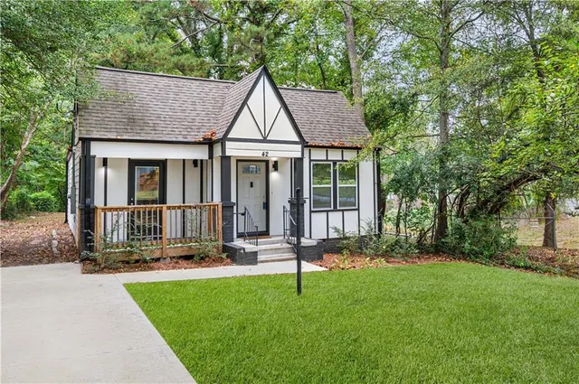 front view of a house with a yard
