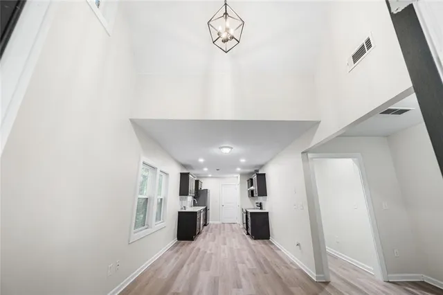 a view of a livingroom with wooden floor