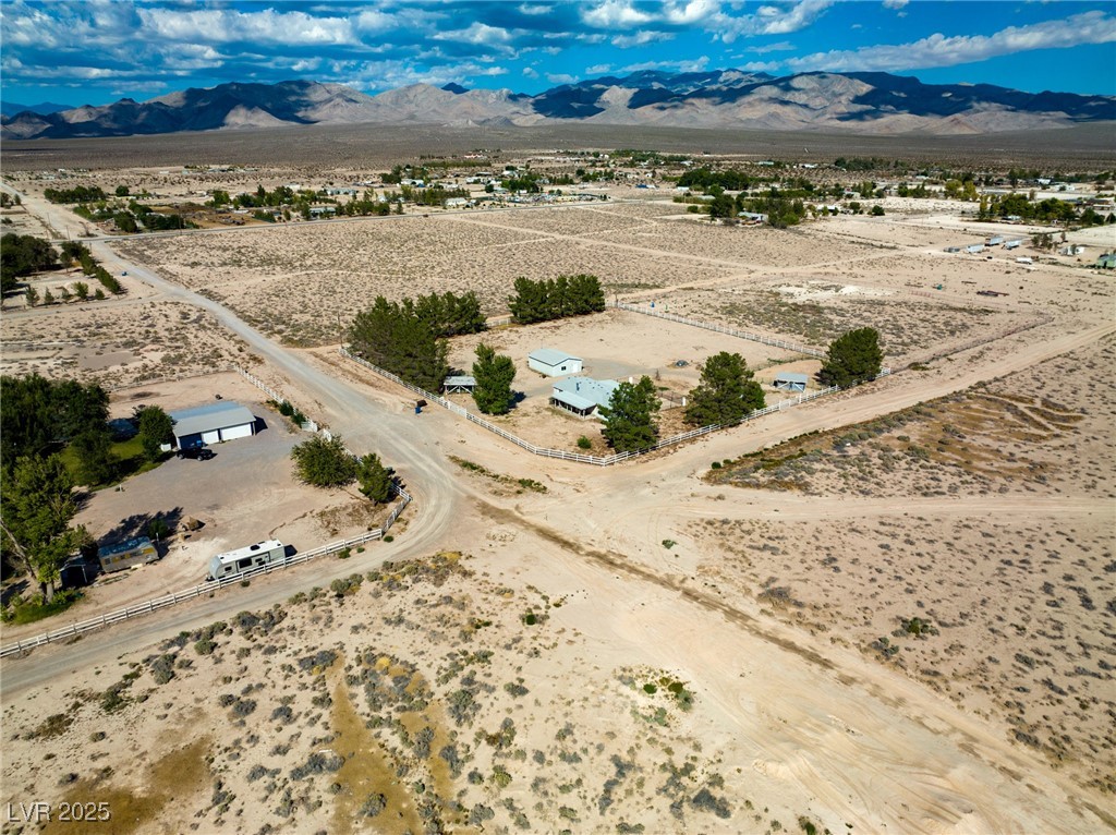 Marble Sandy Valley, NV 89019 - Photo 29 of 31 Birds eye view of property featuring a rural view, a mountain view, and a desert view