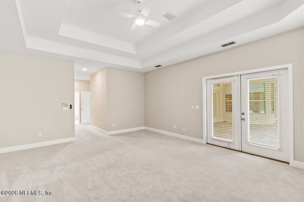 337 South Mill View Way Ponte Vedra Beach, FL 32082 - Photo 30 of 55 an empty room with a empty space and windows
